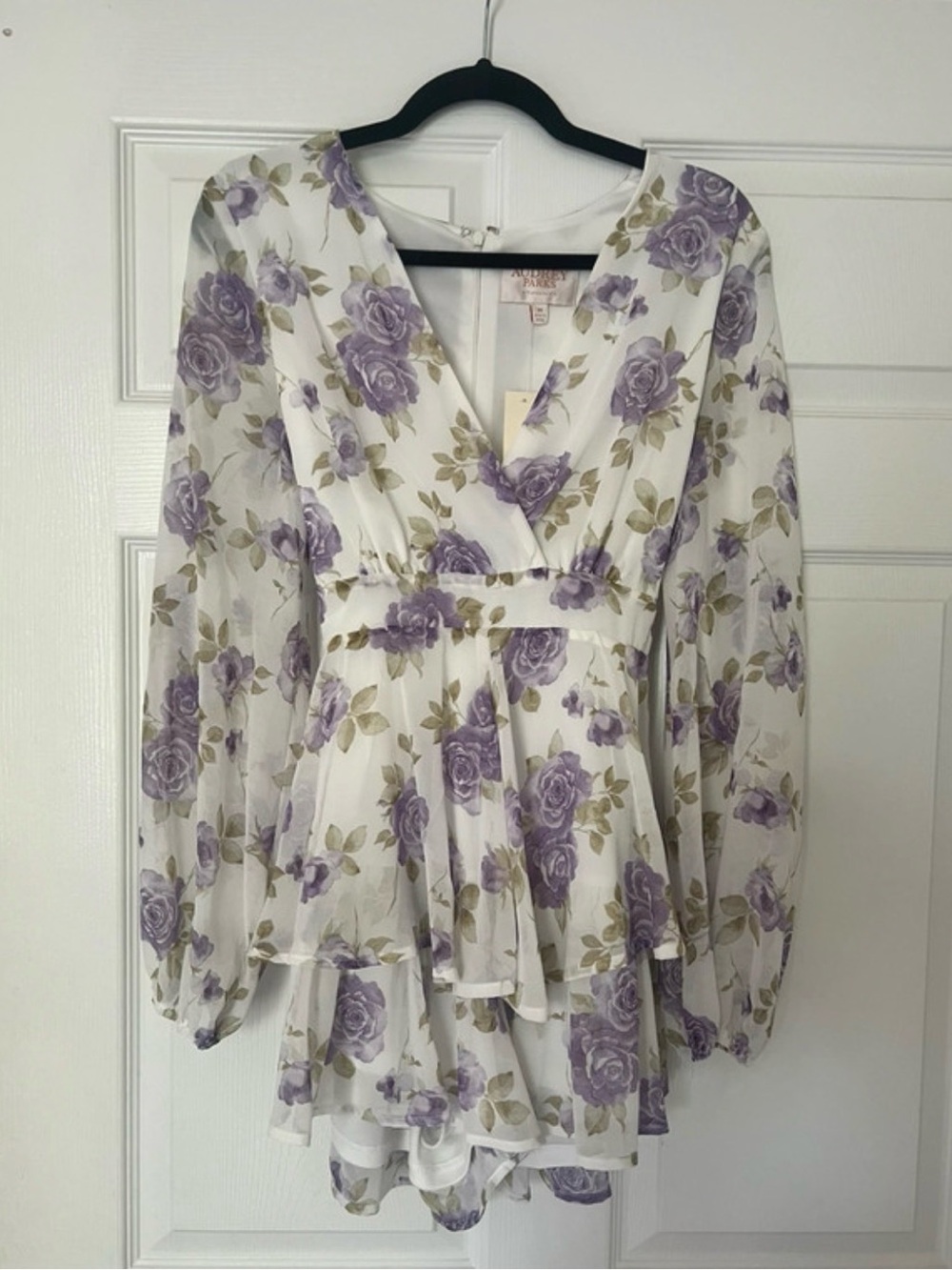 Purple and white floral romper
